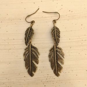 Gold feather earrings